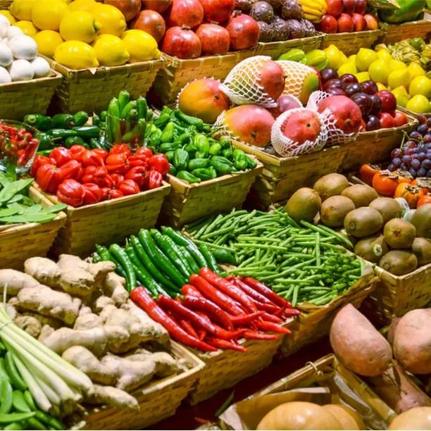 Colorful market display of fresh fruits and vegetables
