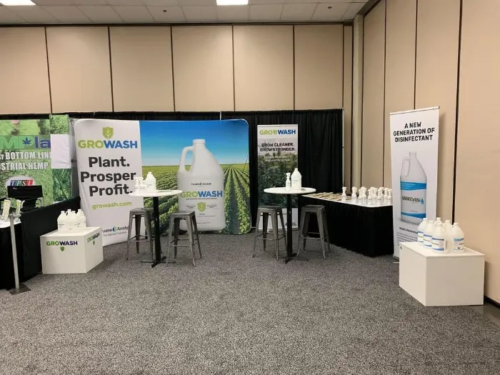 GROWASH trade show booth with product displays and banners